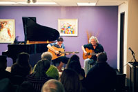 Adult student performing guitar